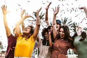 group-of-friends-enjoying-party-throwing-confetti-C7NJQTG - Copy